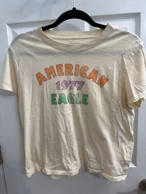 Crop American Eagle Outfitters Cream Graphic Tee with Retro Print